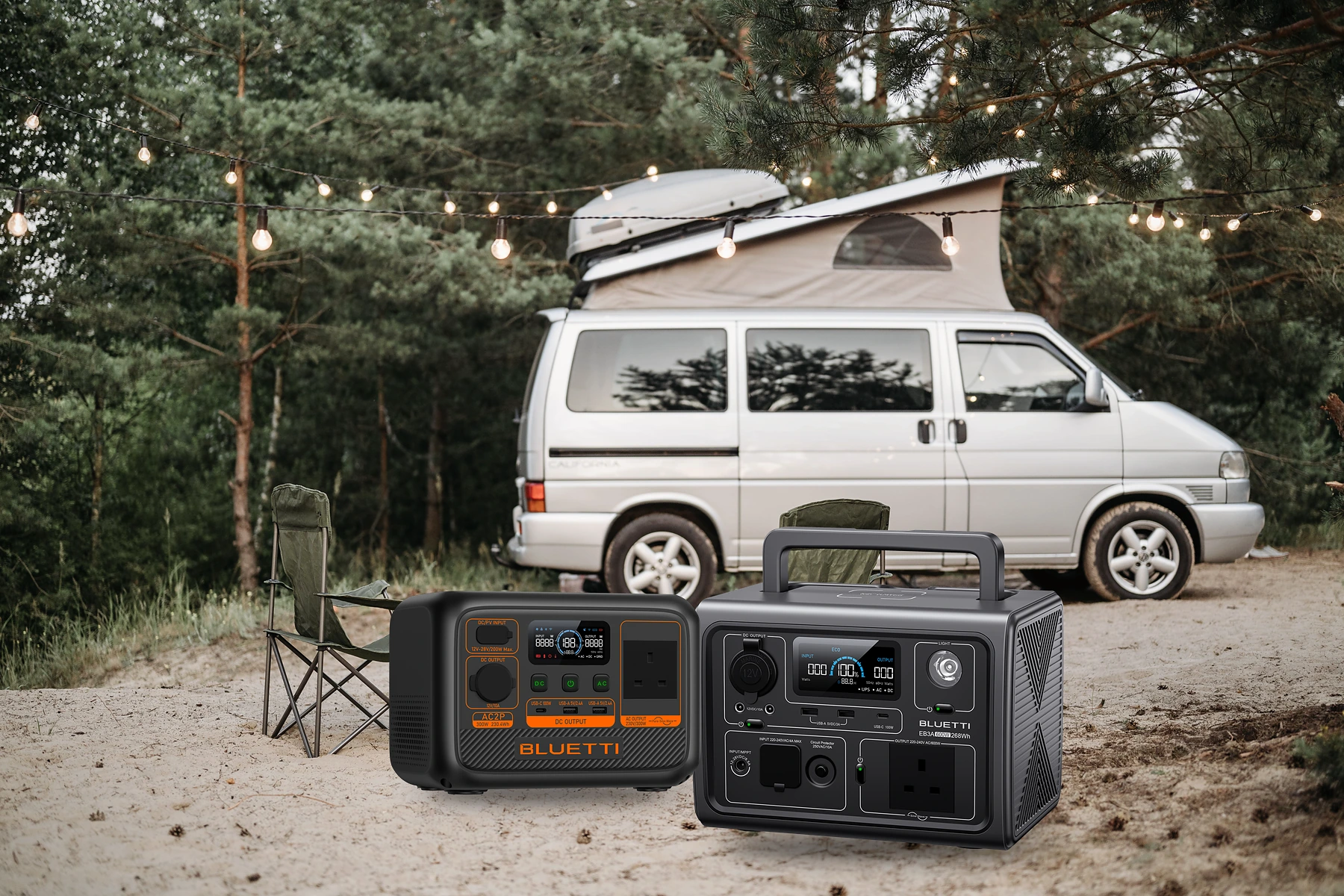 Genuine BLUETTI AC2P and EB3A portable power stations beside a campervan at a peaceful countryside campsite.